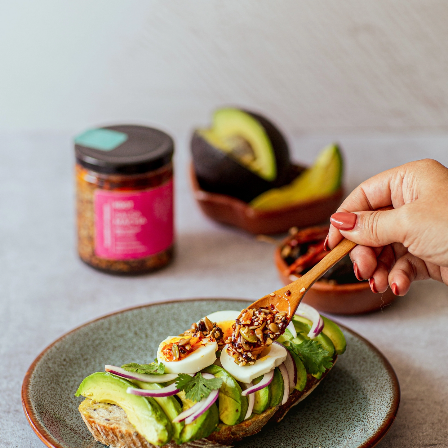 Koot Salsa Macha spooned over eggs